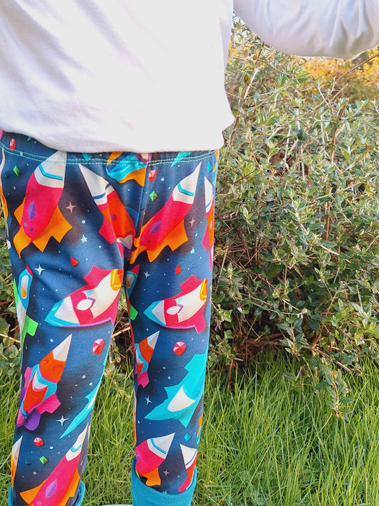 Multicoloured rocket print childrens leggings