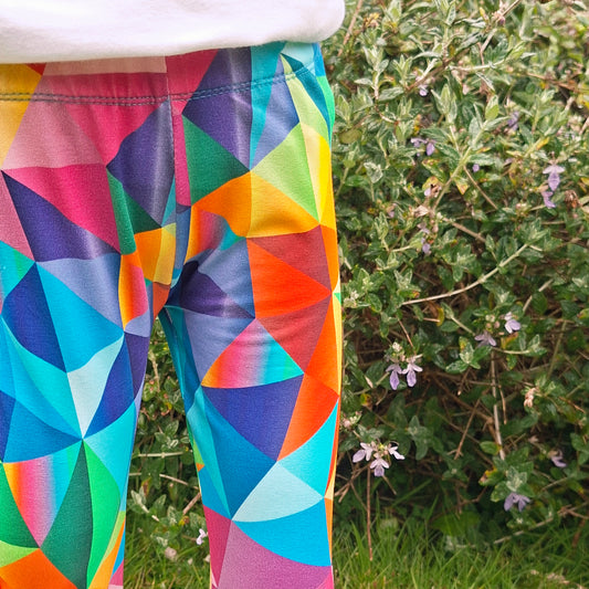 Colourful children's leggings in a rainbow print fabric