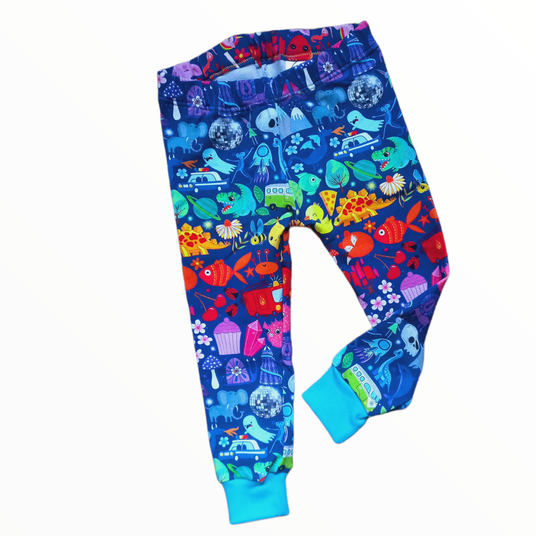 Multicoloured character cuffed childrens leggings. On a blue background, with light blue ankle cuffs. Made by Wifflepigs Colourful Clothing