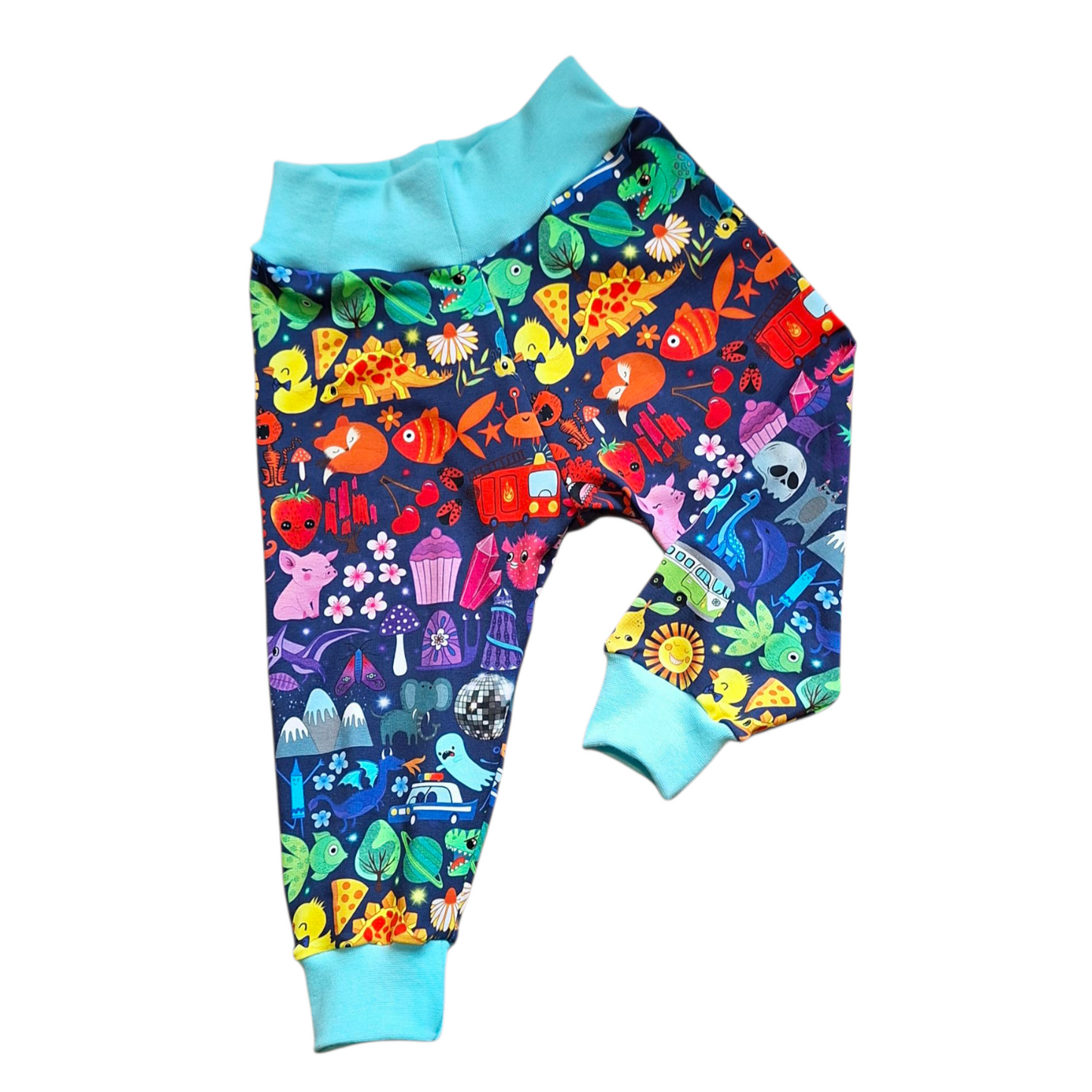 Colourful children's loose fit trousers with various patterns on a white background