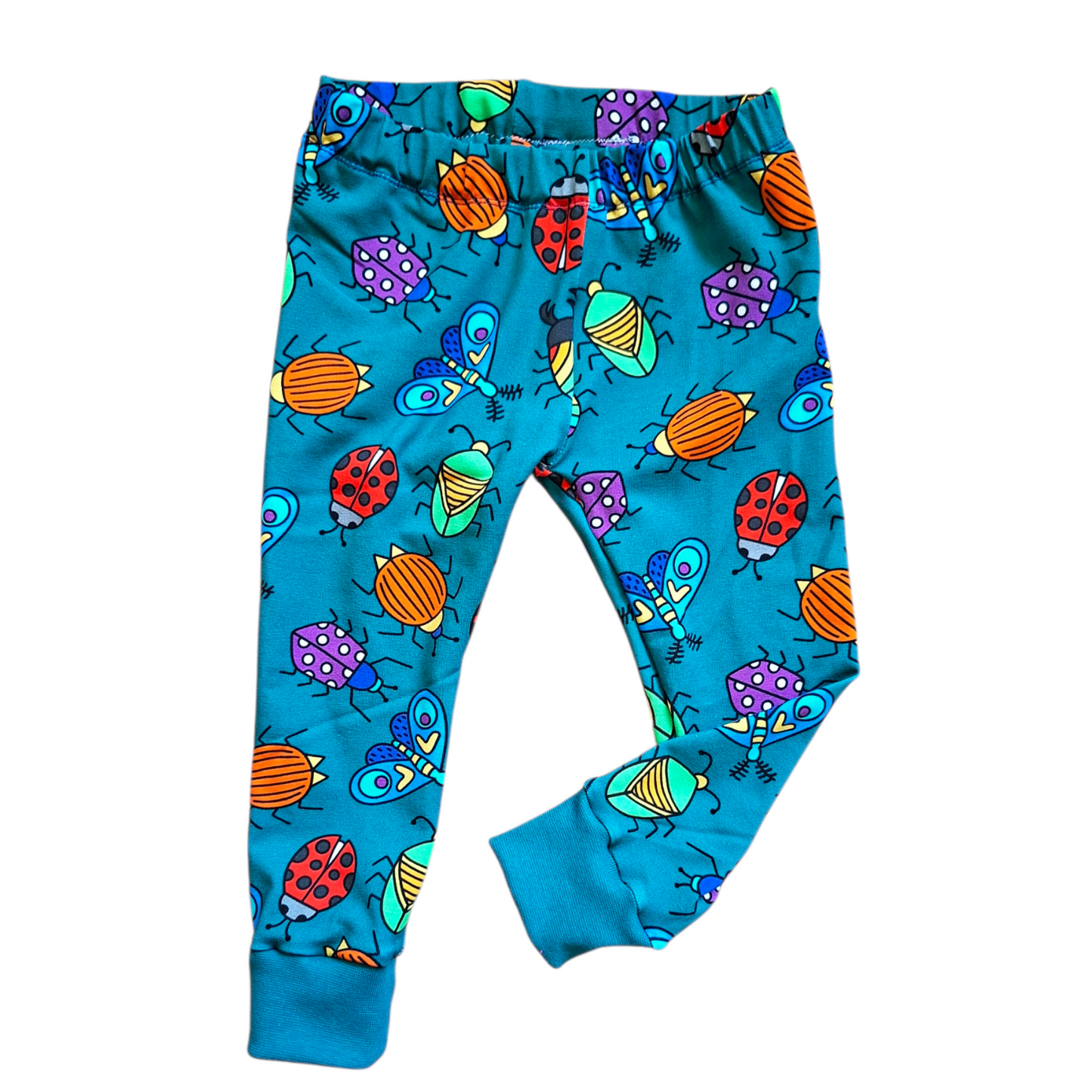 Colorful children's leggings with bug pattern on a white background
