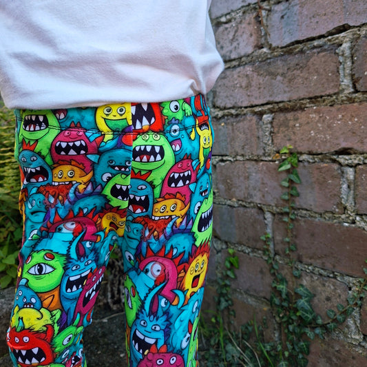 Children's leggings in a multicoloured mix of cartoon monsters
