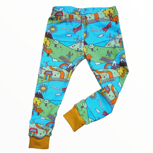 Childrens leggings in a environment print, with allotments, recycle trucks and wind turbines