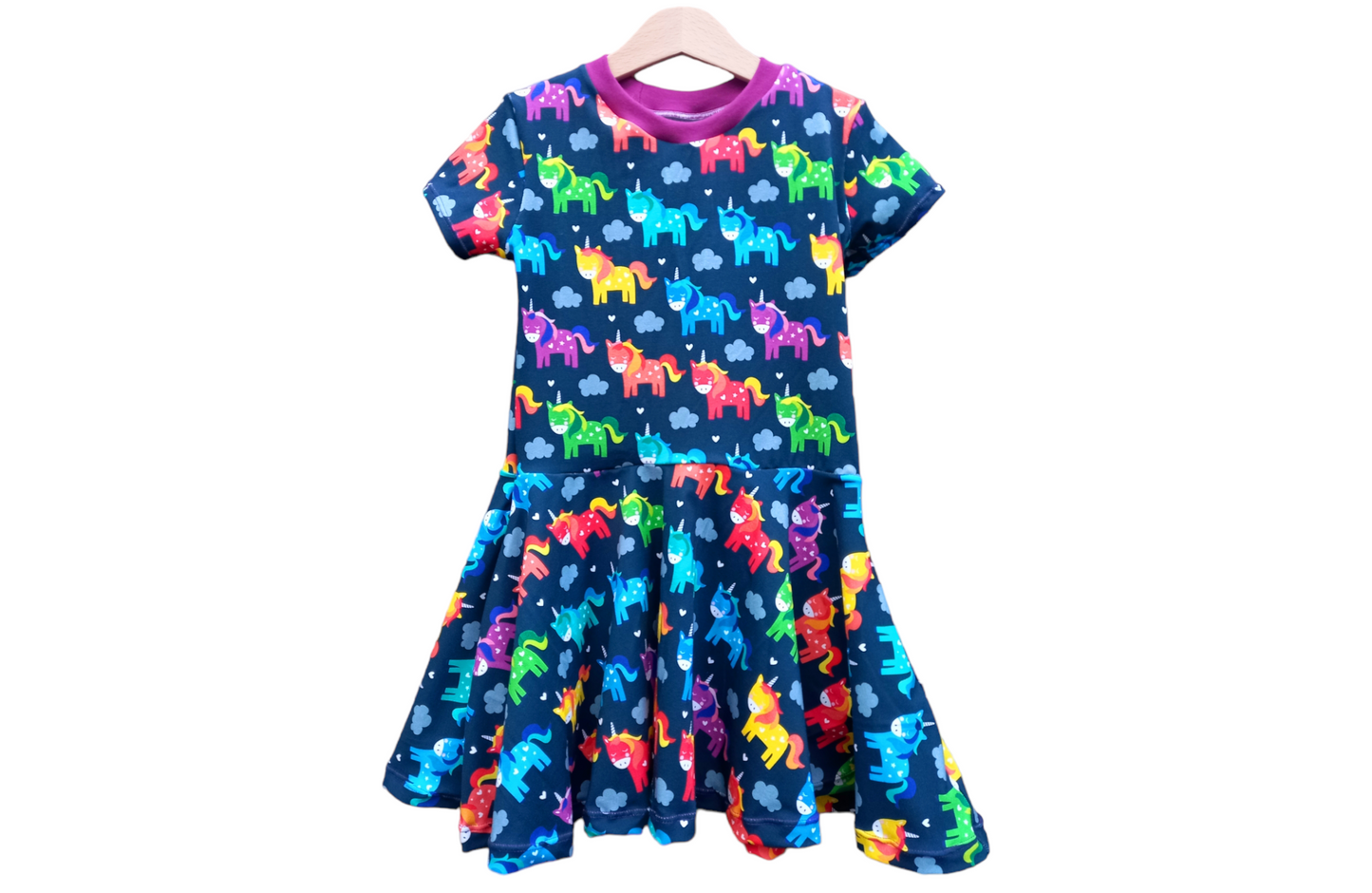 twirly dress with pockets in a unicorn print fabric