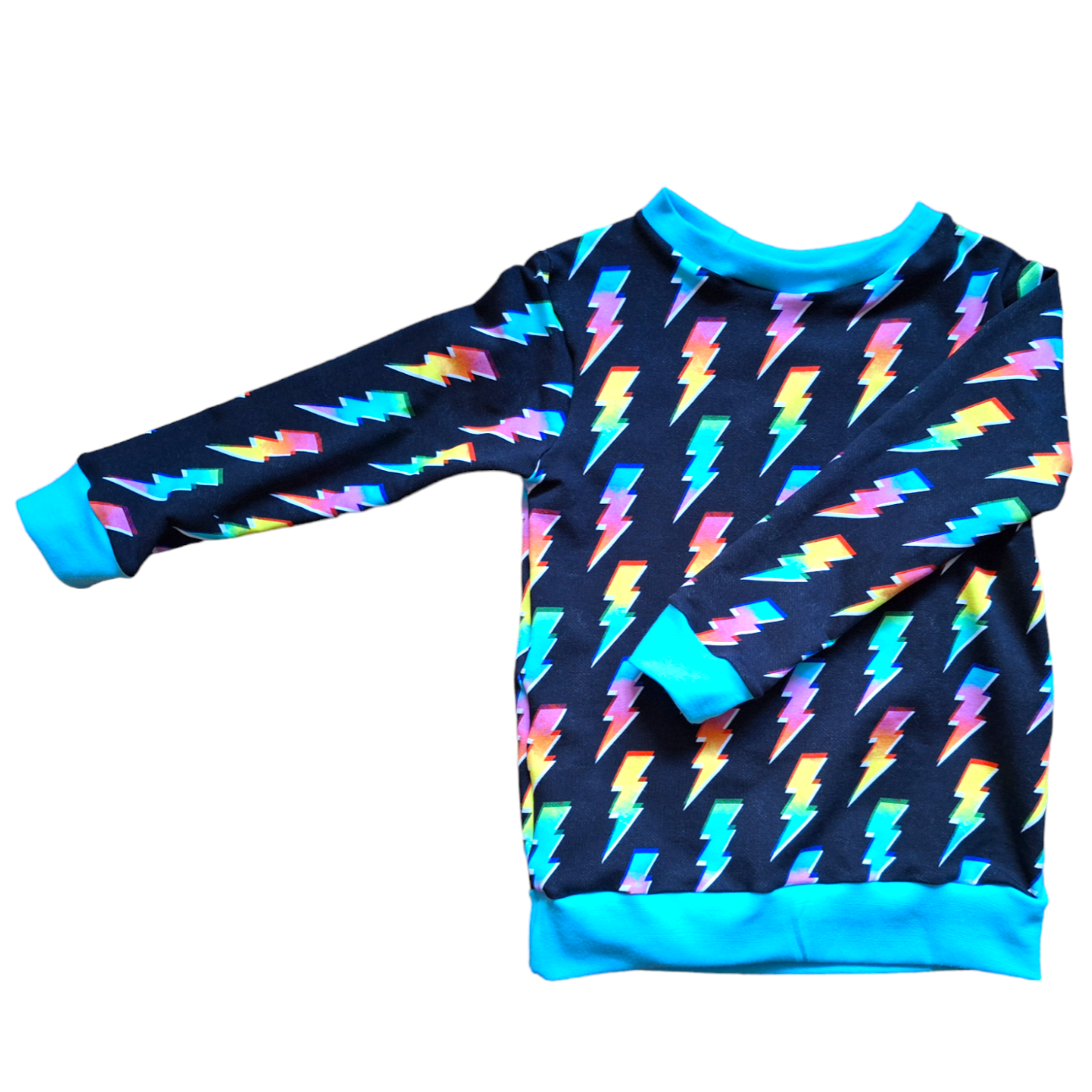 Black childrens jumper with a mix of bright lightning bolts