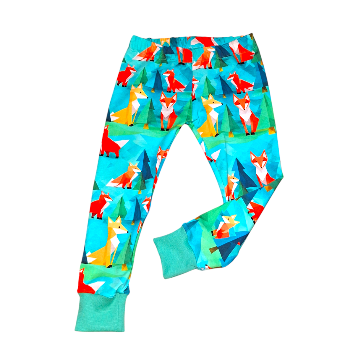Green childrens leggings with red and orange foxes on a white background. Fox print childrens leggings