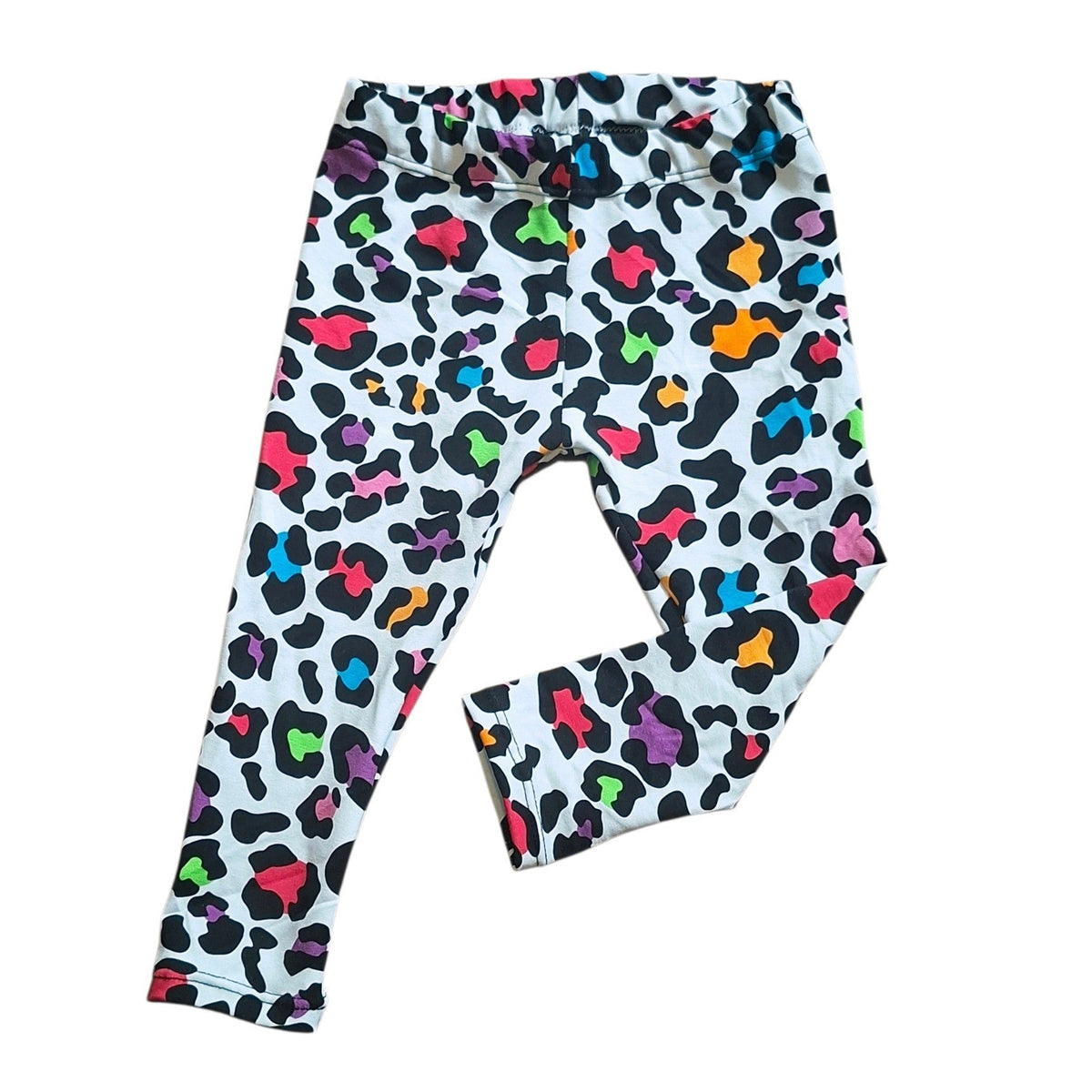 A pair of toddler leggings with a colourful leopard print pattern on a white background, featuring black spots and vibrant accents in pink, blue, green, yellow, and orange.