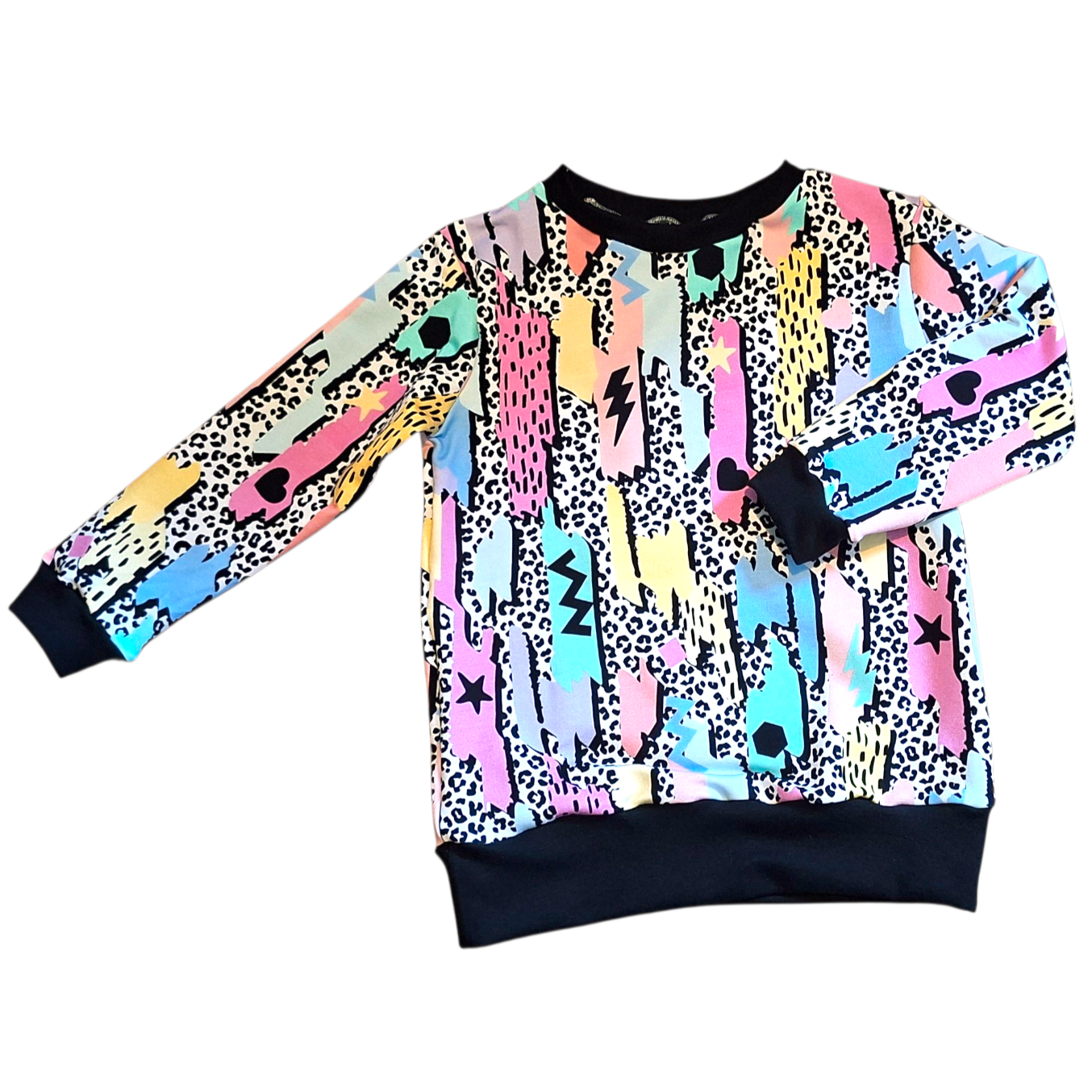 Colorful patterned sweater on a white background