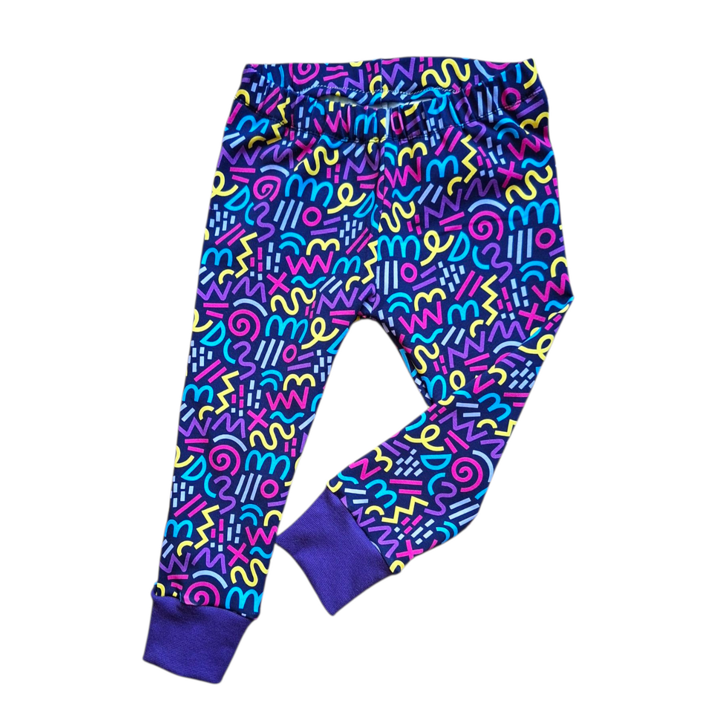 Colorful patterned pants on a white background