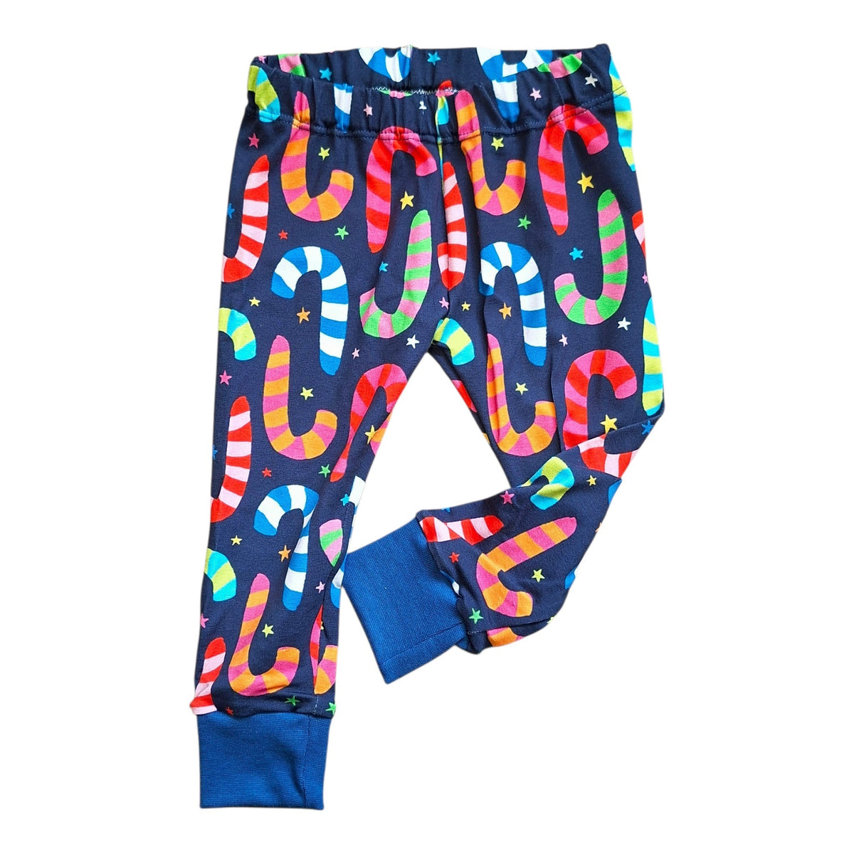 Kids' navy cuffed leggings with colourful candy cane and star print and blue ankle cuffs