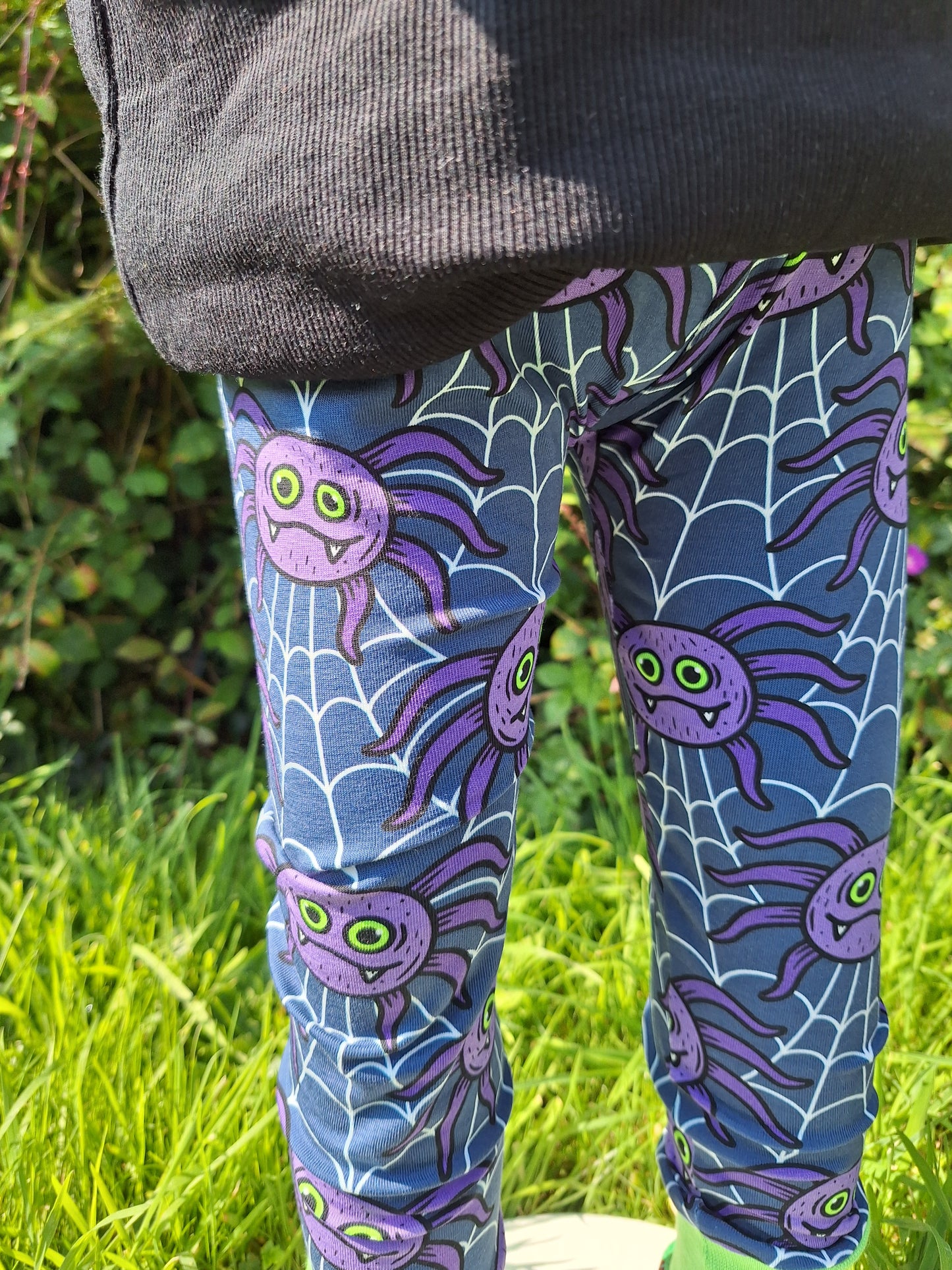 Navy childrens leggings in a Spider print