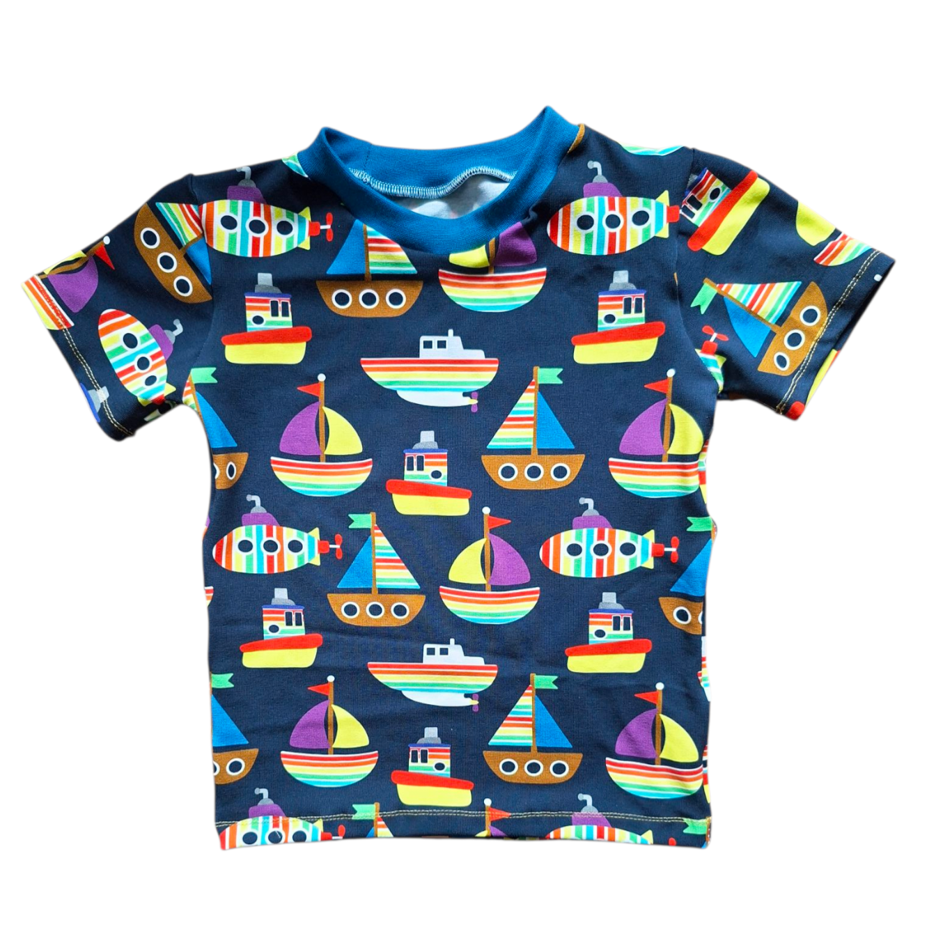 Navy children's tee shirt in rainbow boat fabric