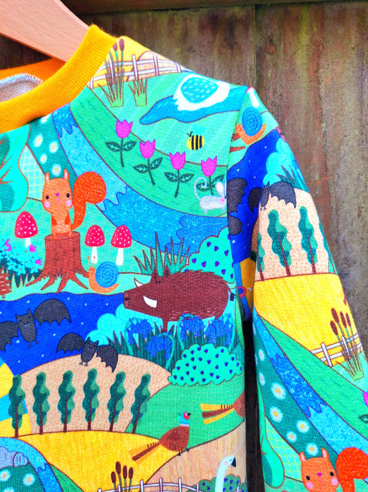 Childrens jumper featuring a mix of British Wildlife