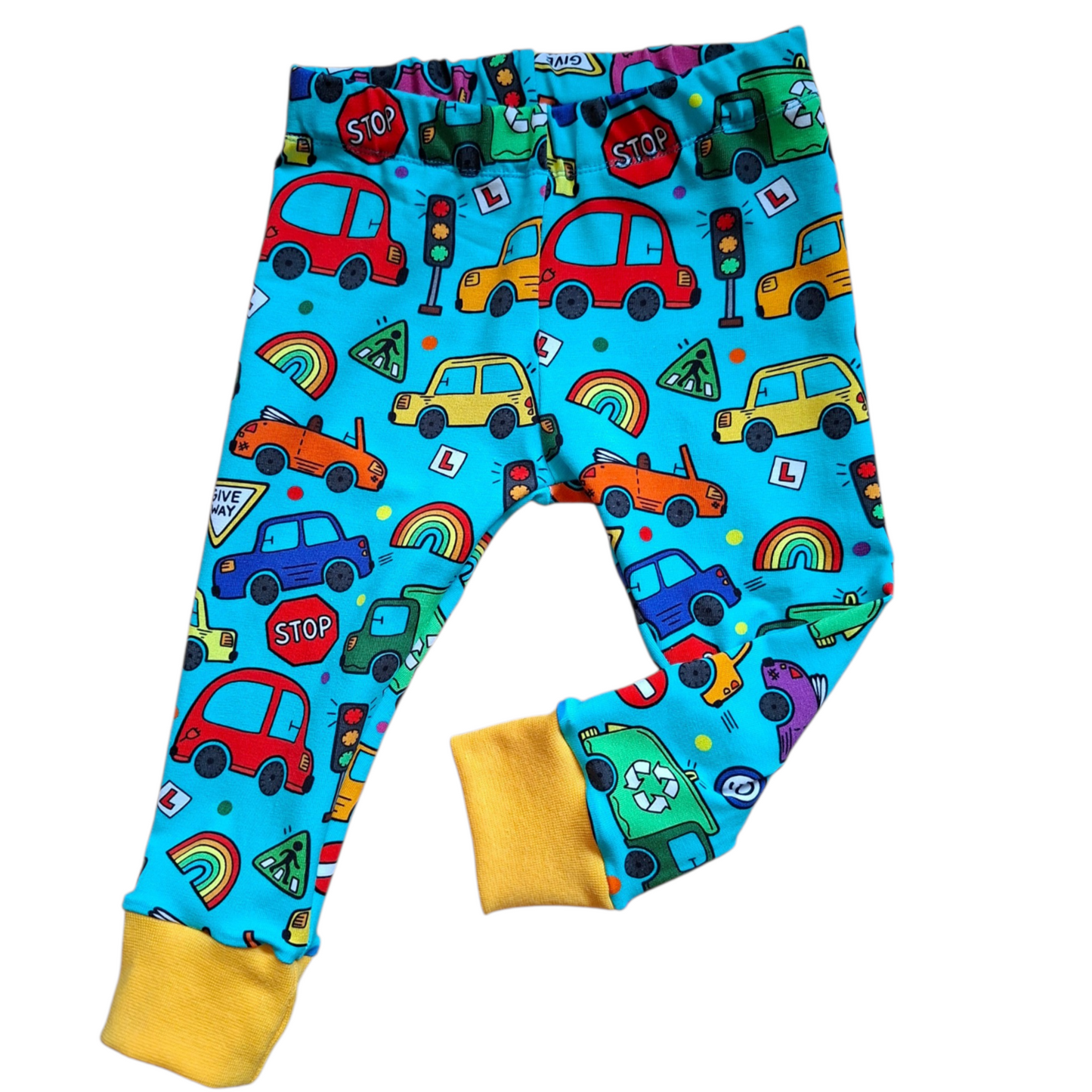 Colourful children's leggings with car and traffic light pattern on a blue background