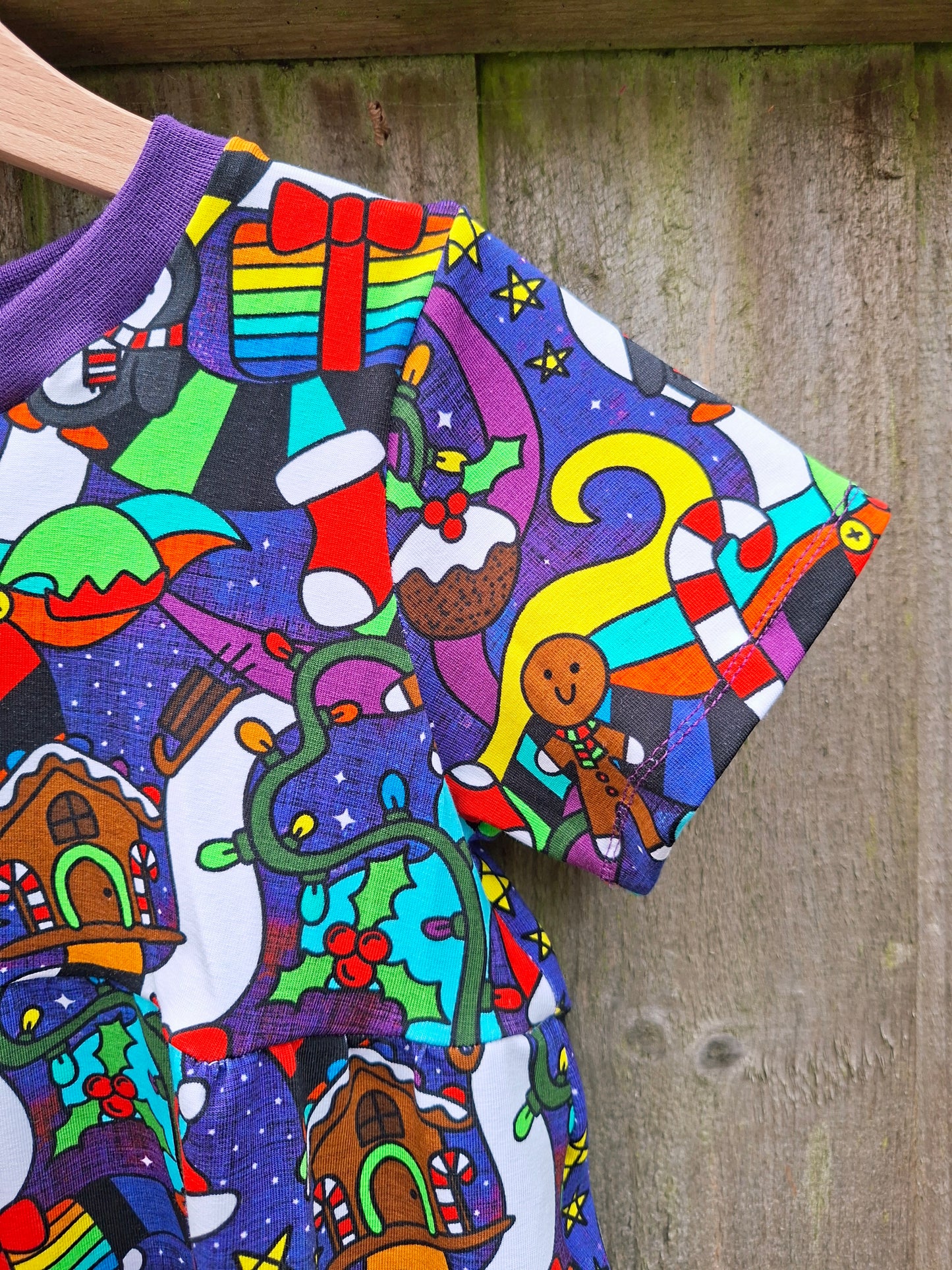 Colorful Christmas fabric on a wooden surface