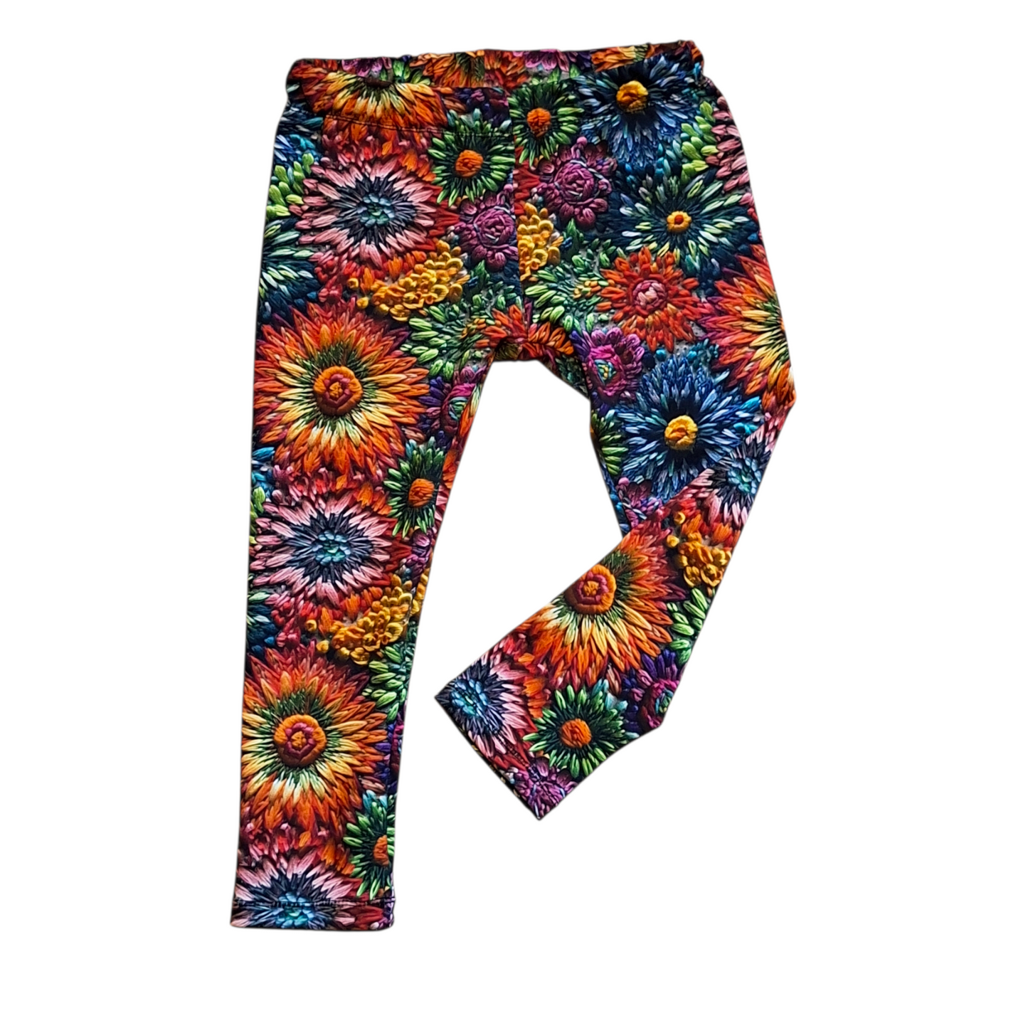 Children's leggings in a mix of rainbow flowers in an embroidery style