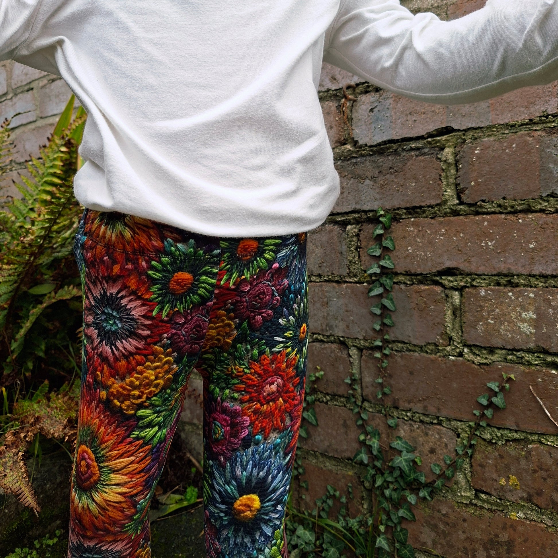 Children's leggings in a rainbow mix of embroidery effect flowers 