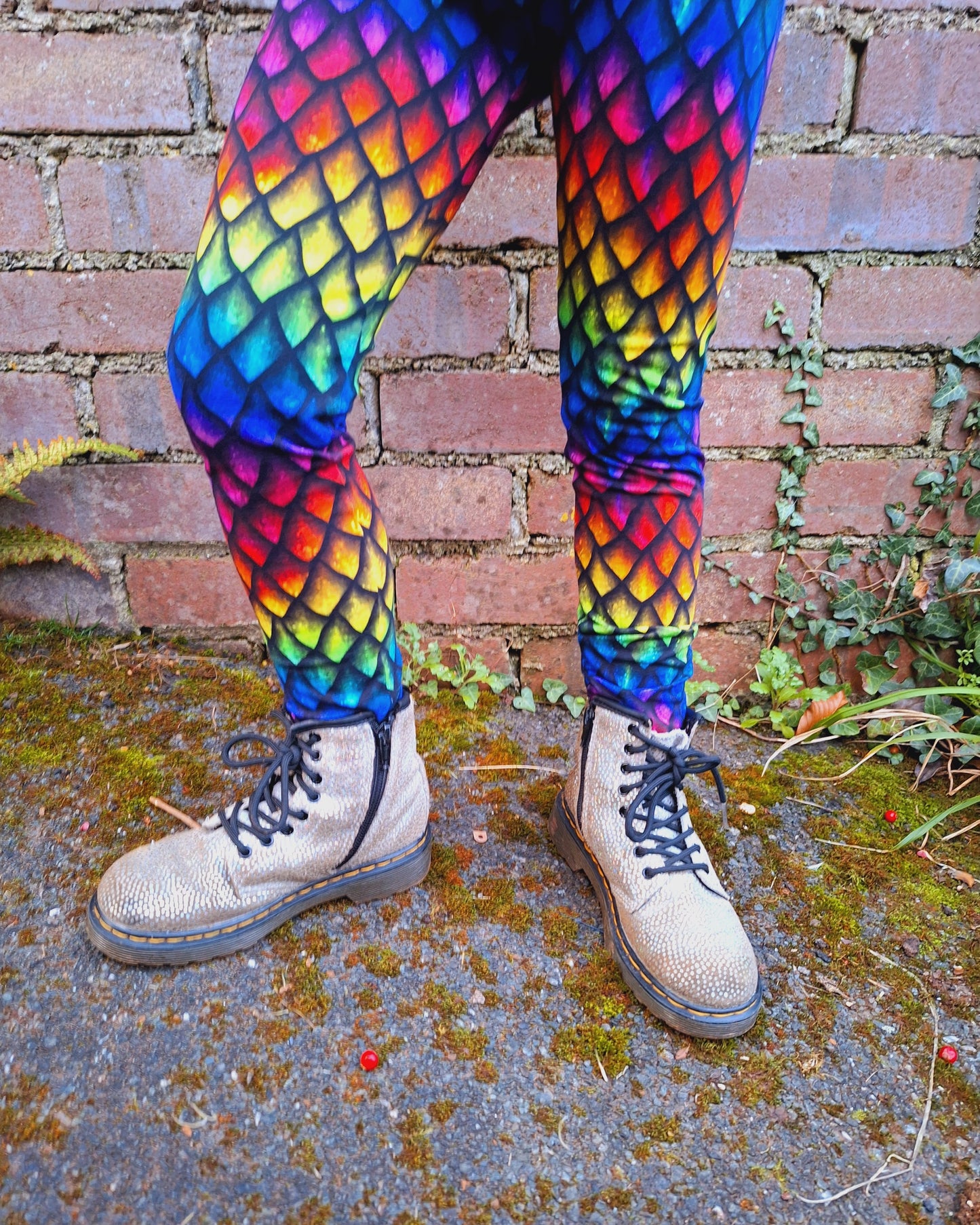 Dragon scale childrens leggings in a mix of rainbow colours  