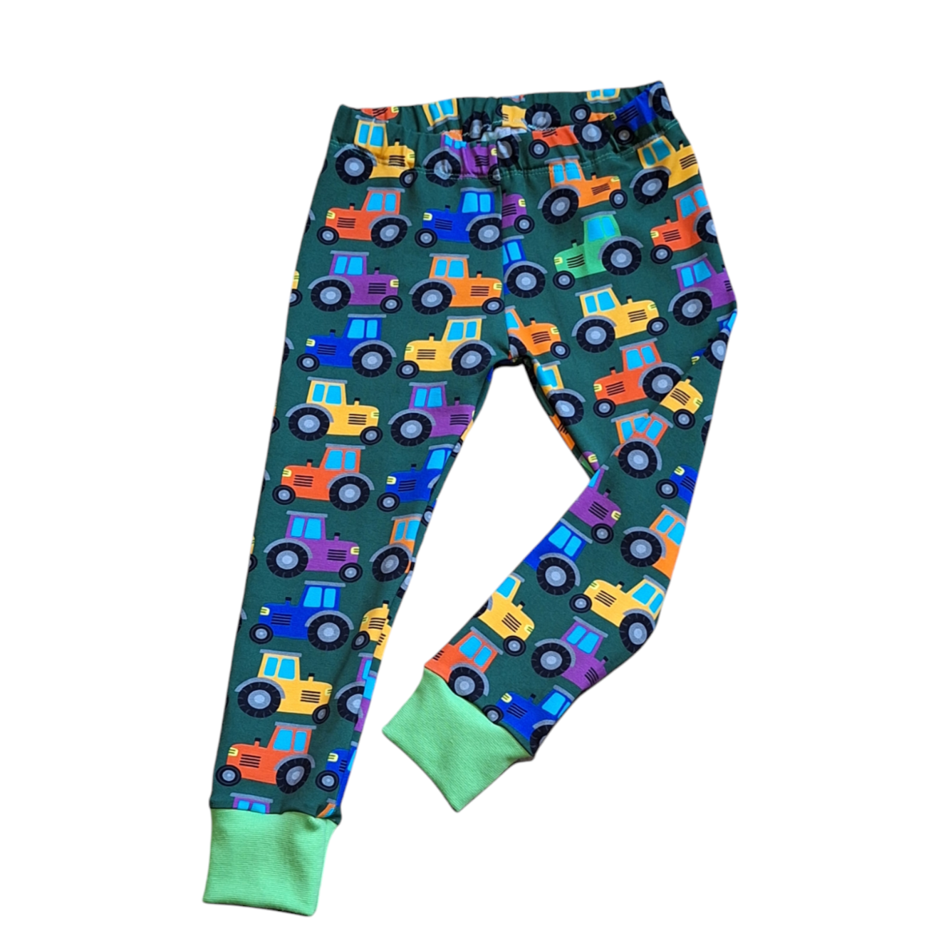 Childrens leggings in a rainbow tractor print 