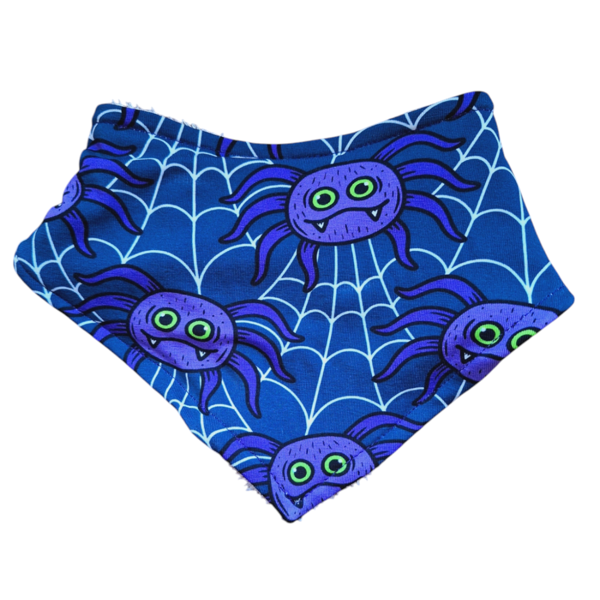 Blue dribble bib with purple spiders and white webs