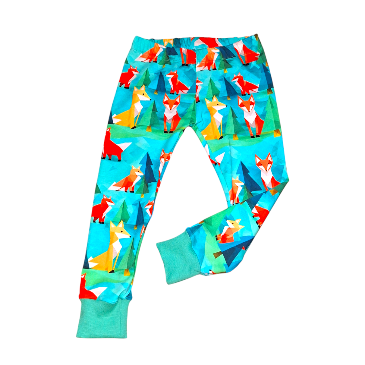 Green childrens leggings with red and orange foxes on a white background. Fox print childrens leggings 