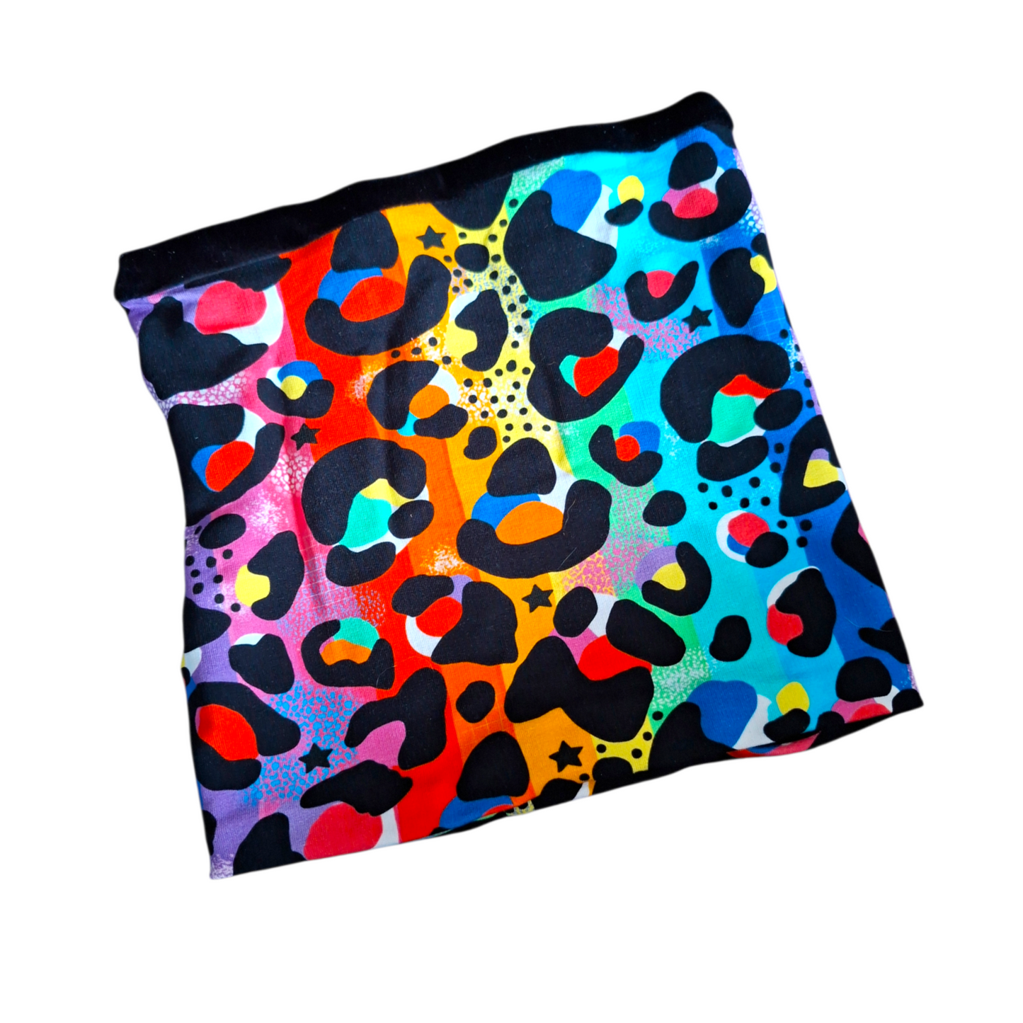 Colorful patterned fabric with black shapes on a white background