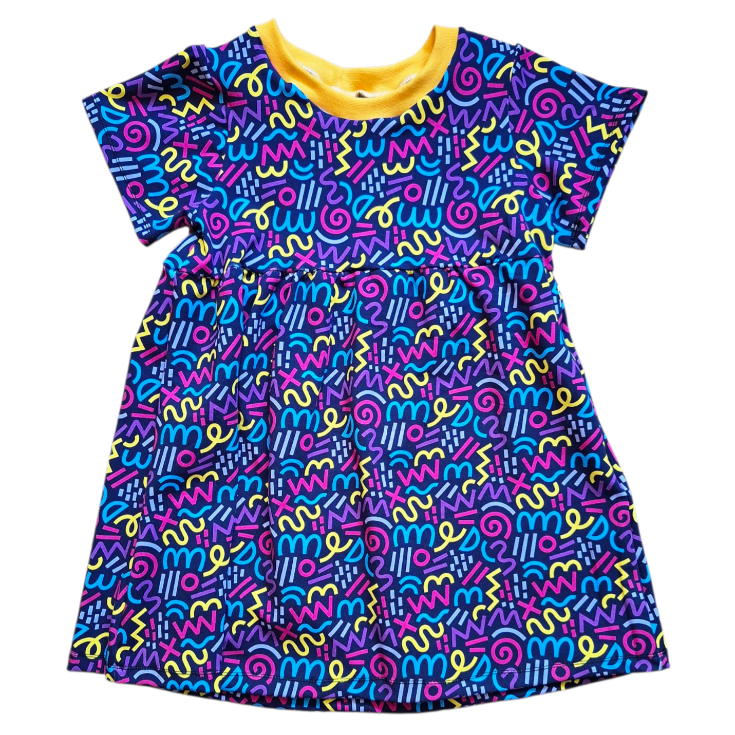 Colorful patterned dress with a yellow collar on a white background
