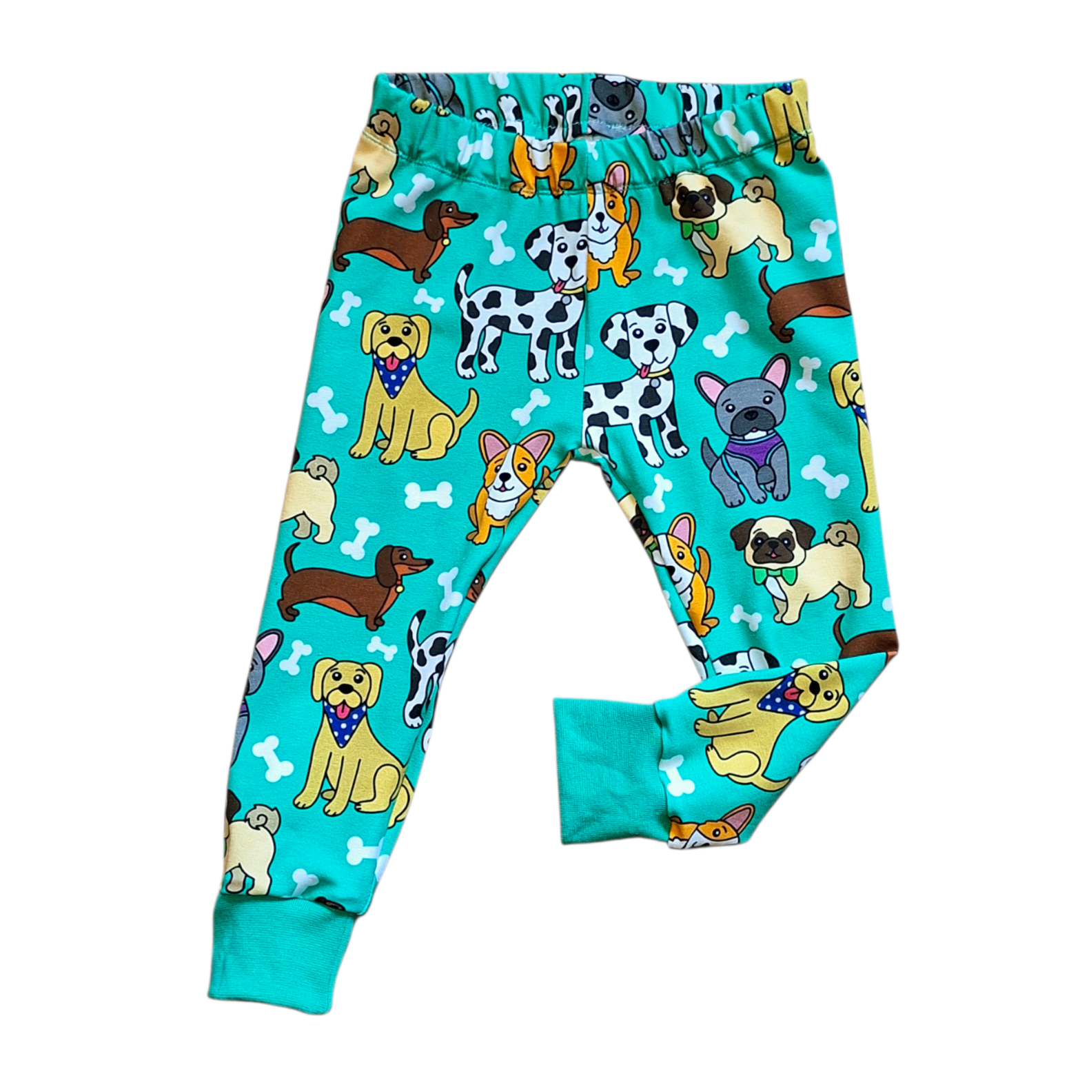 Children's leggings with dog pattern on a turquoise background
